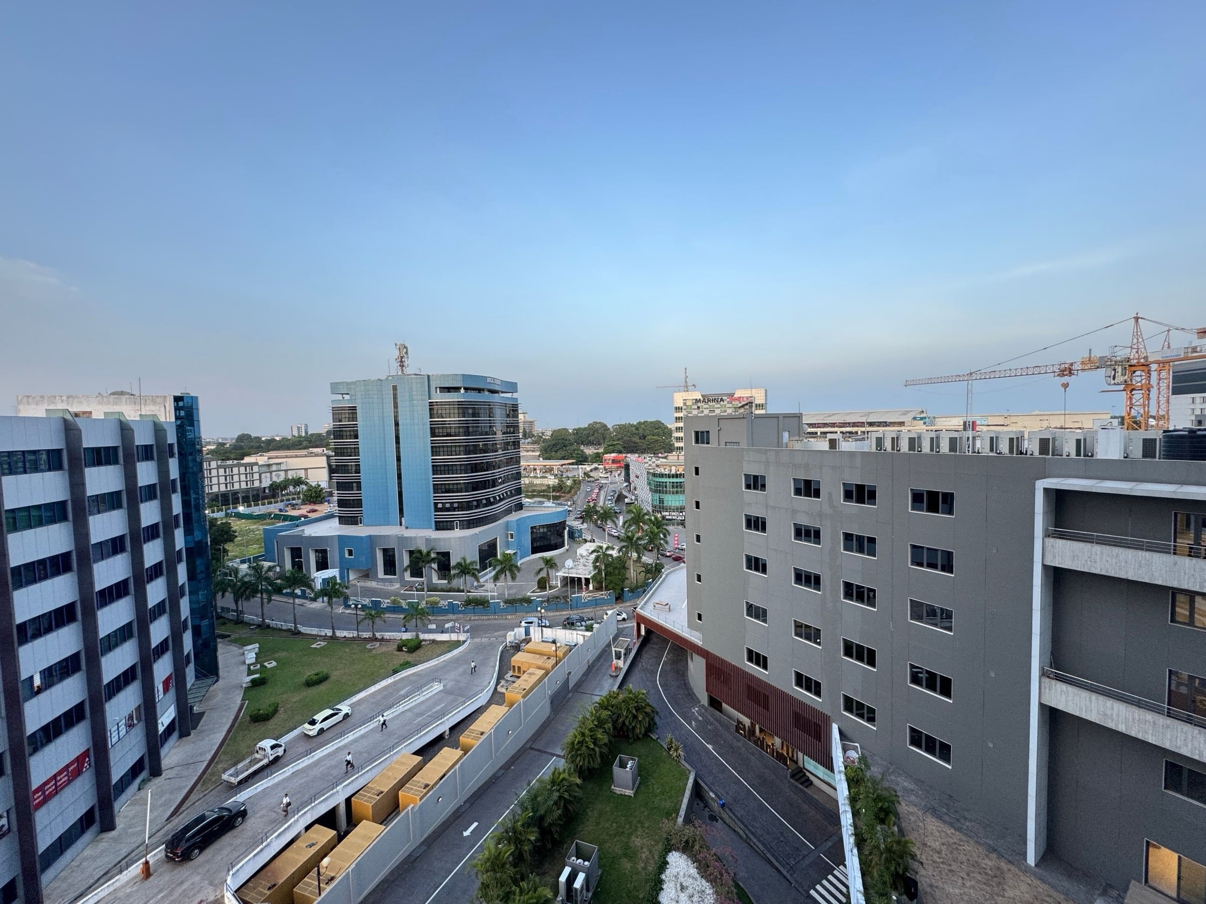 Modern skyline of Accra, Ghana, under a clear sky
